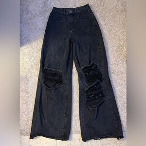 Black flared ripped jeans
